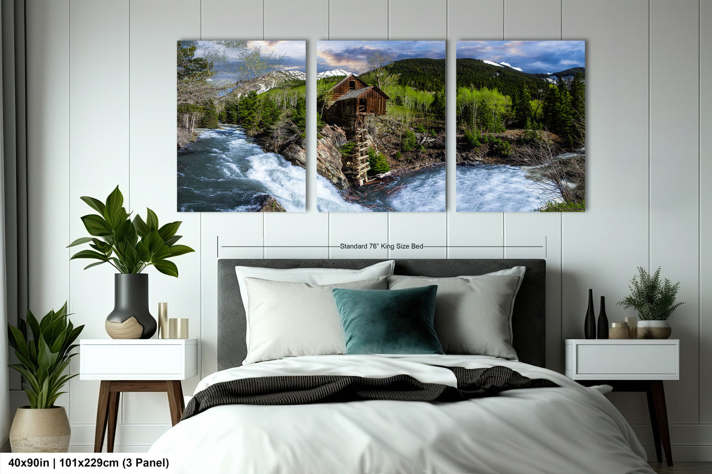 a bed room with a neatly made bed and a painting on the wall