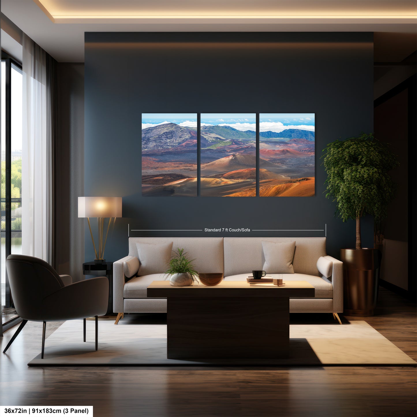 The image is a modern living room with a large, three-panel landscape painting hanging on the wall. The painting depicts a desert landscape with mountains in the background. The room features a white sofa, a wooden coffee table, and a large window that allows natural light to fill the space.