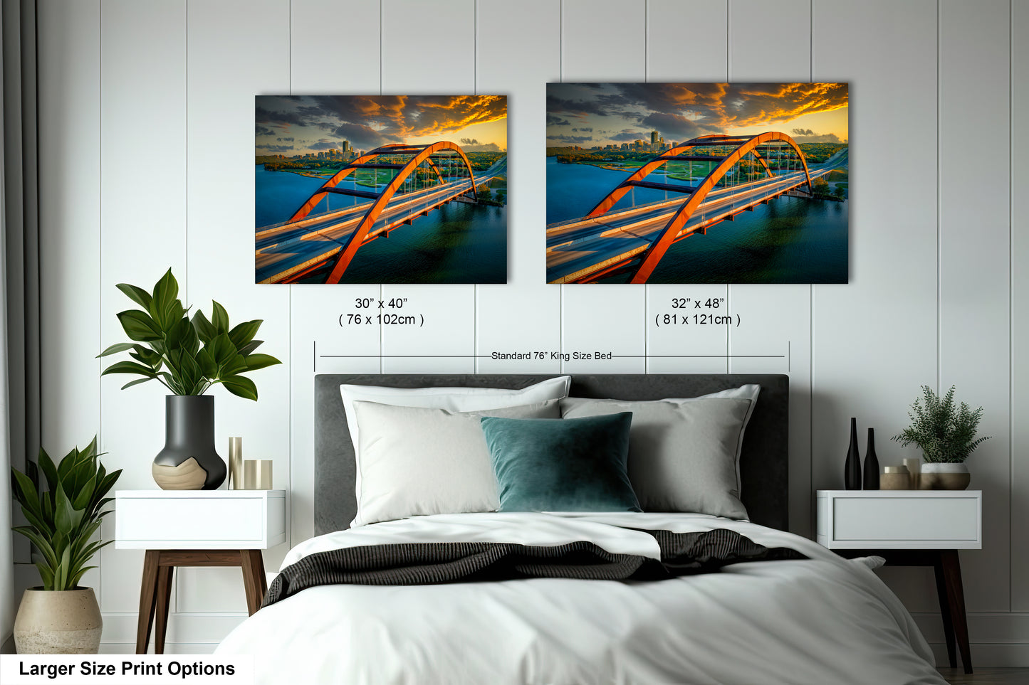 a bed with two pictures of a bridge hanging on the wall