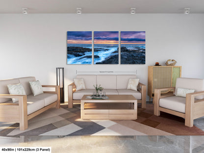a living room filled with furniture and a painting on the wall