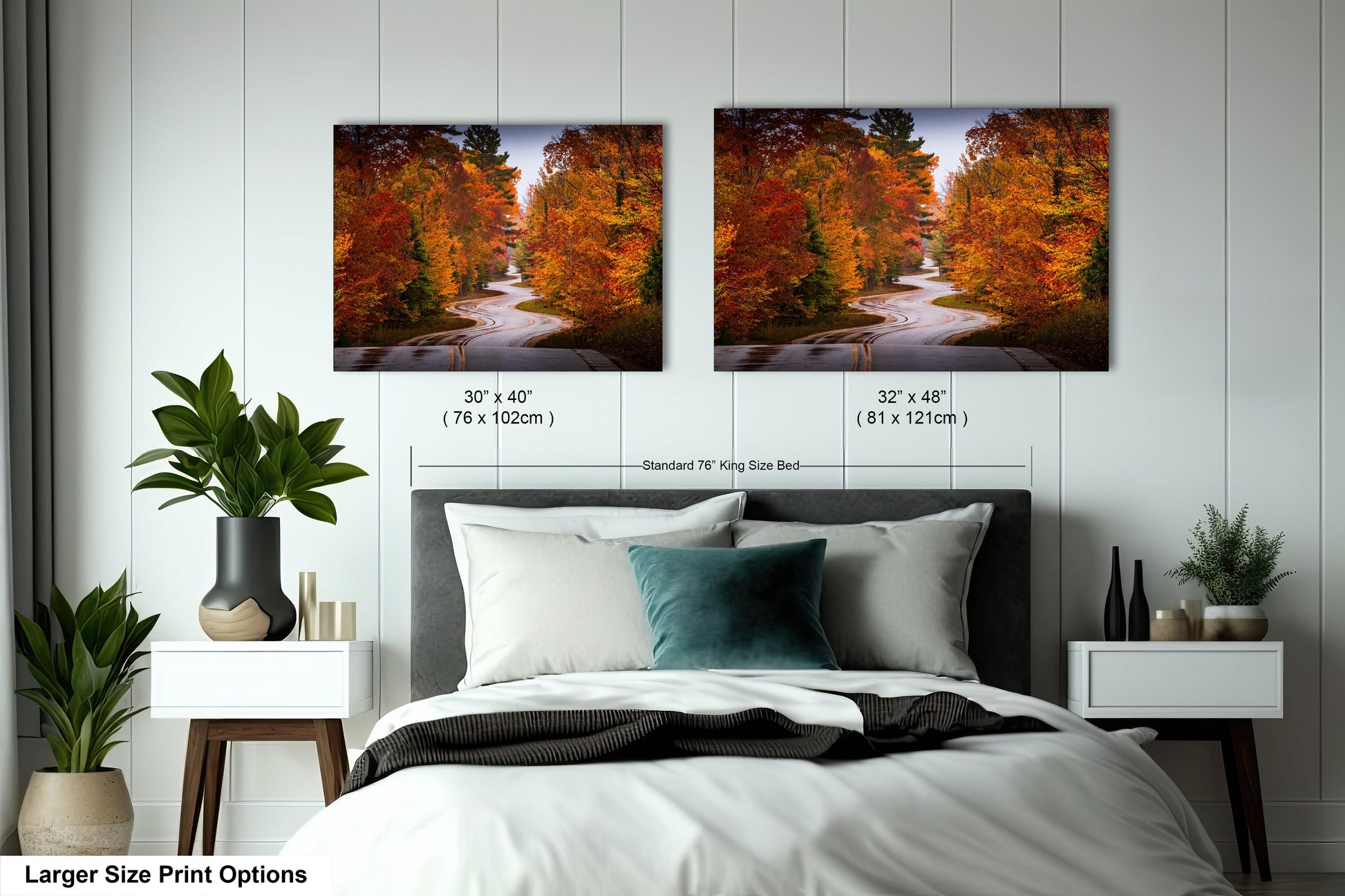 a bedroom with a bed and two pictures on the wall