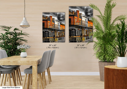 a dining room with a table and chairs next to a potted plant