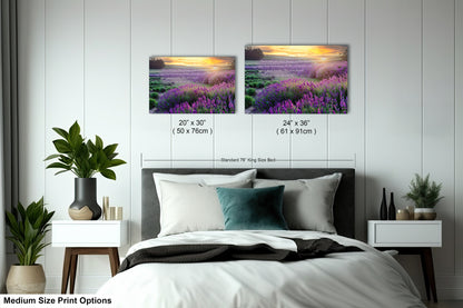 a bedroom with a bed and two pictures on the wall