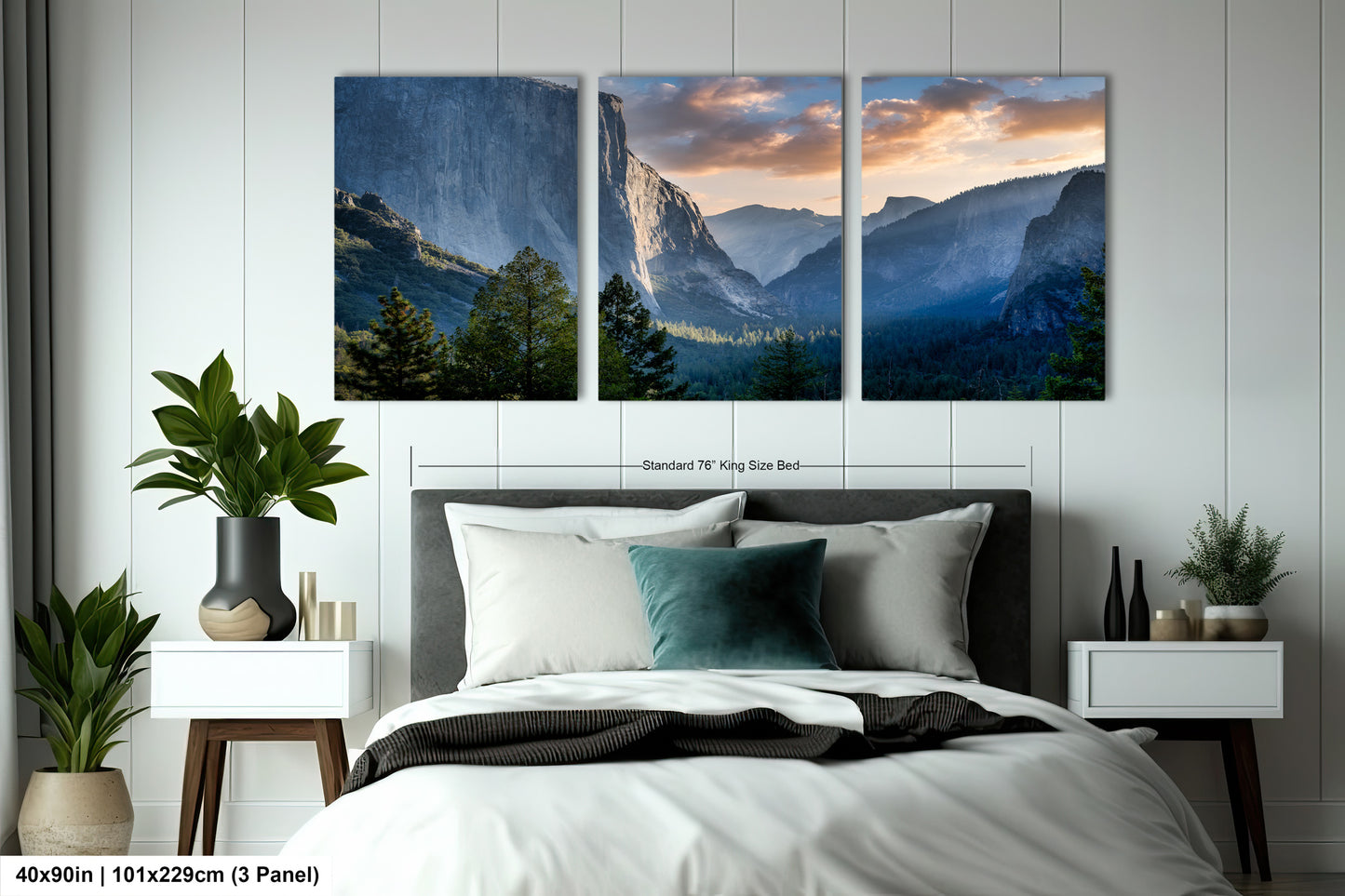a bedroom with a bed and two pictures on the wall