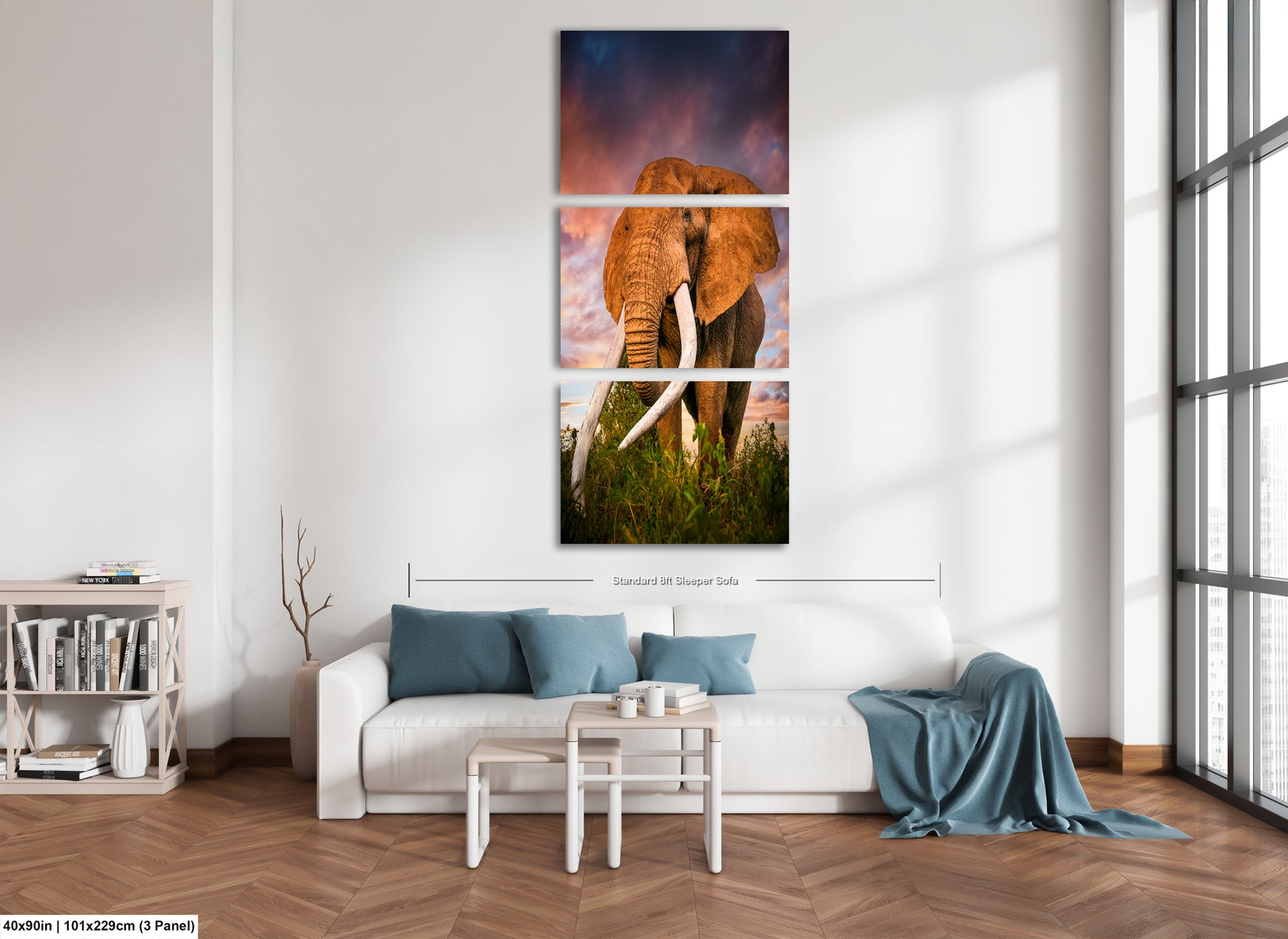 a living room with a couch and a painting of an elephant