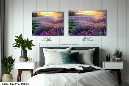 a bedroom with a bed and two pictures on the wall