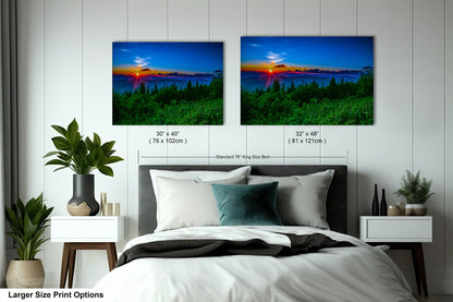 a bedroom with a bed and two pictures on the wall