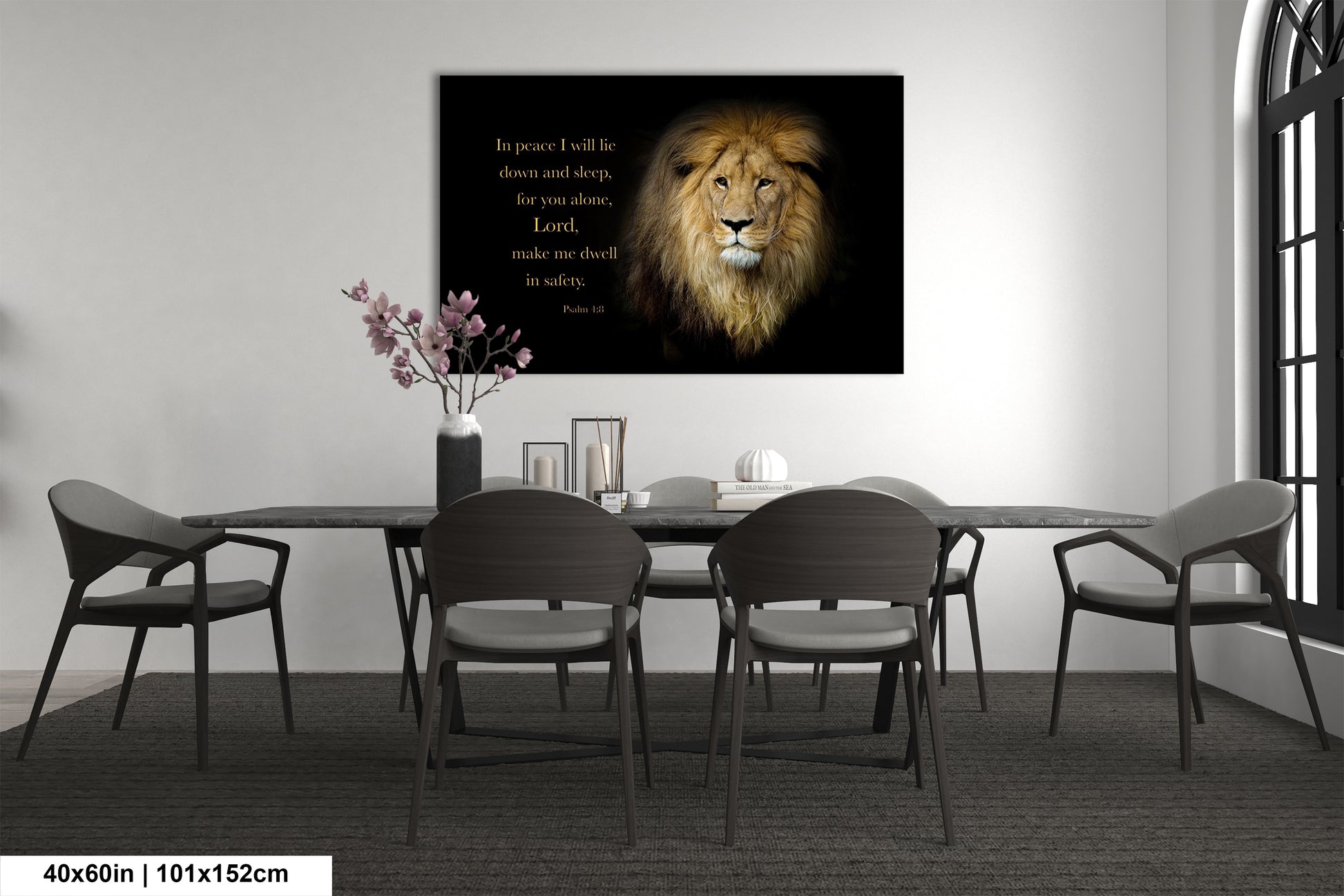 a dining room table with chairs and a picture of a lion on the wall