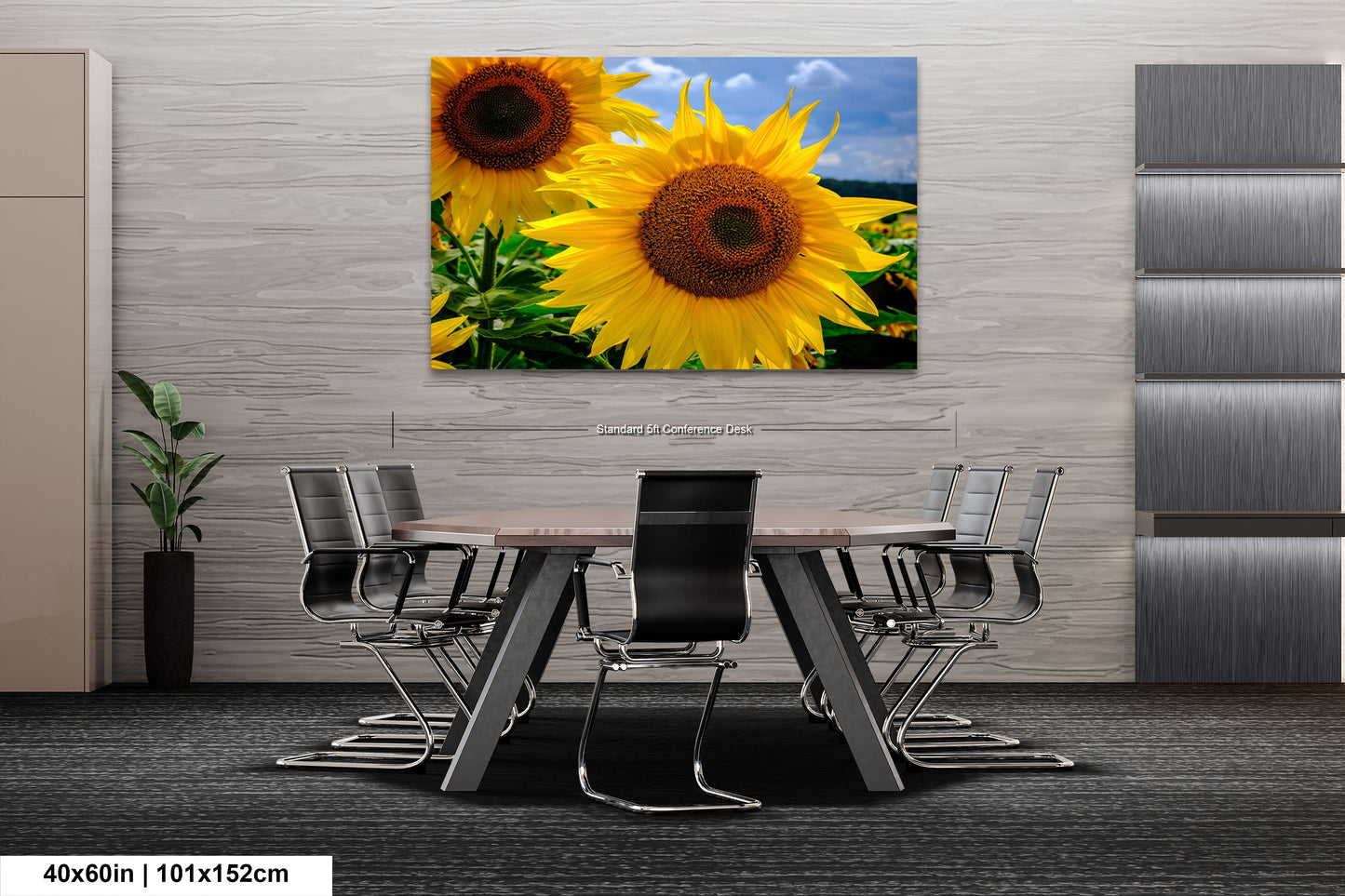 a dining room table with chairs and a painting of sunflowers on the wall