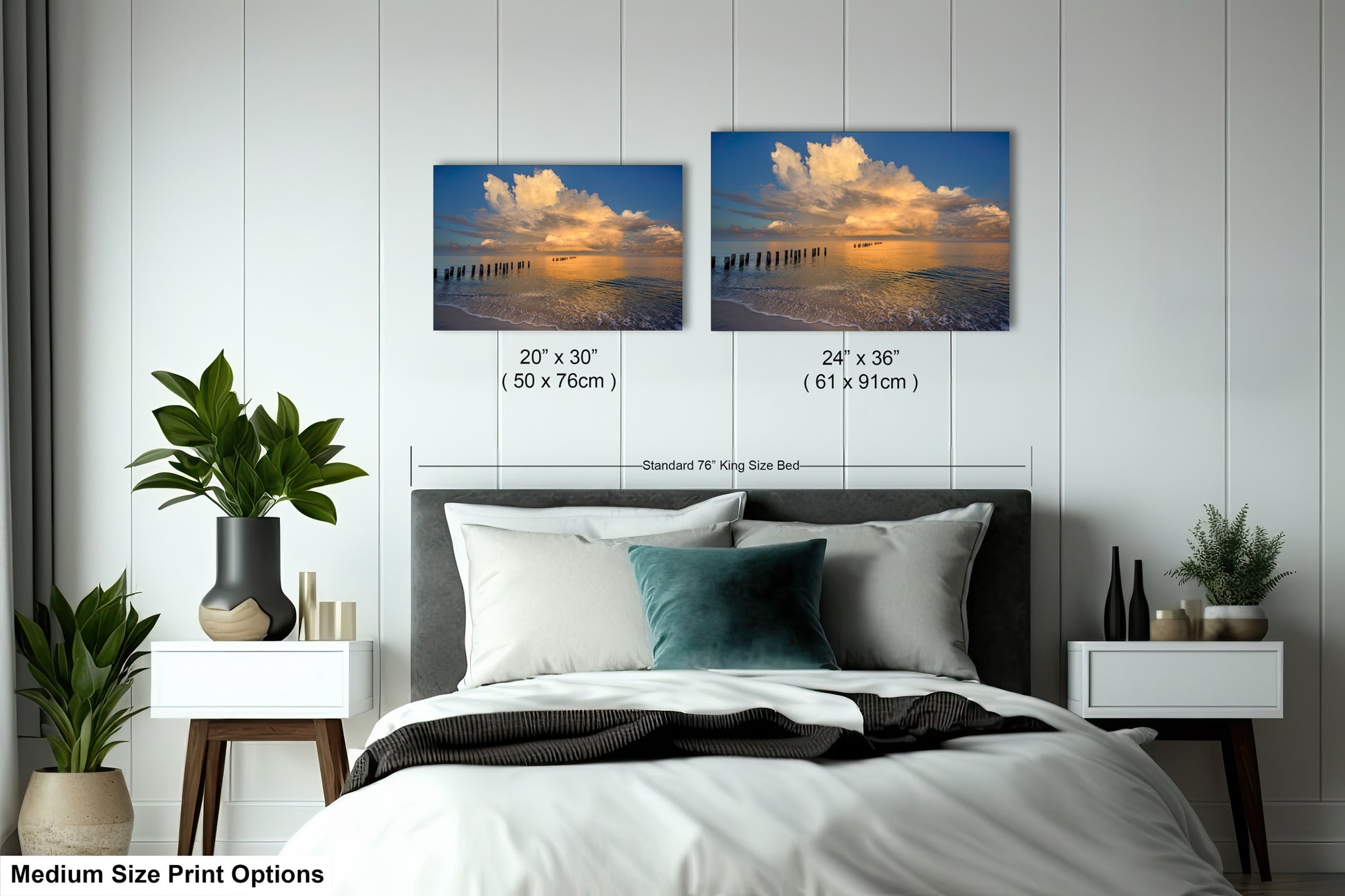 a bedroom with a bed and two pictures on the wall
