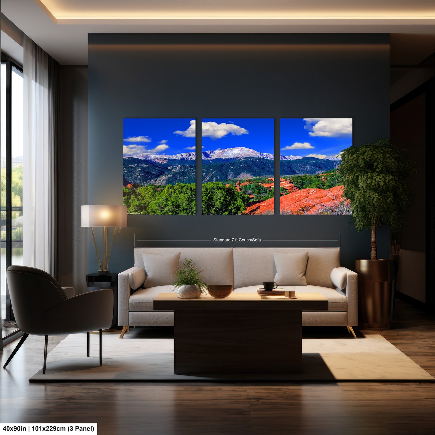 a living room filled with furniture and a painting on the wall