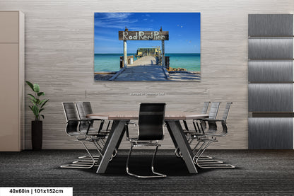 a dining room with a table and chairs