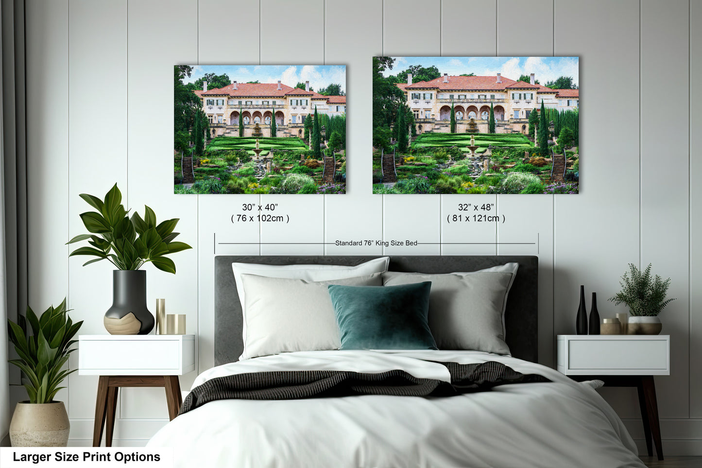 a bedroom with a large bed and two pictures on the wall