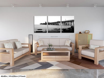 a living room filled with furniture and a painting on the wall