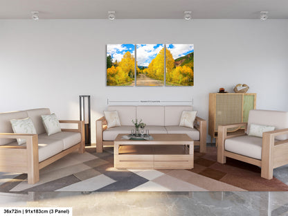 a living room filled with furniture and a painting on the wall