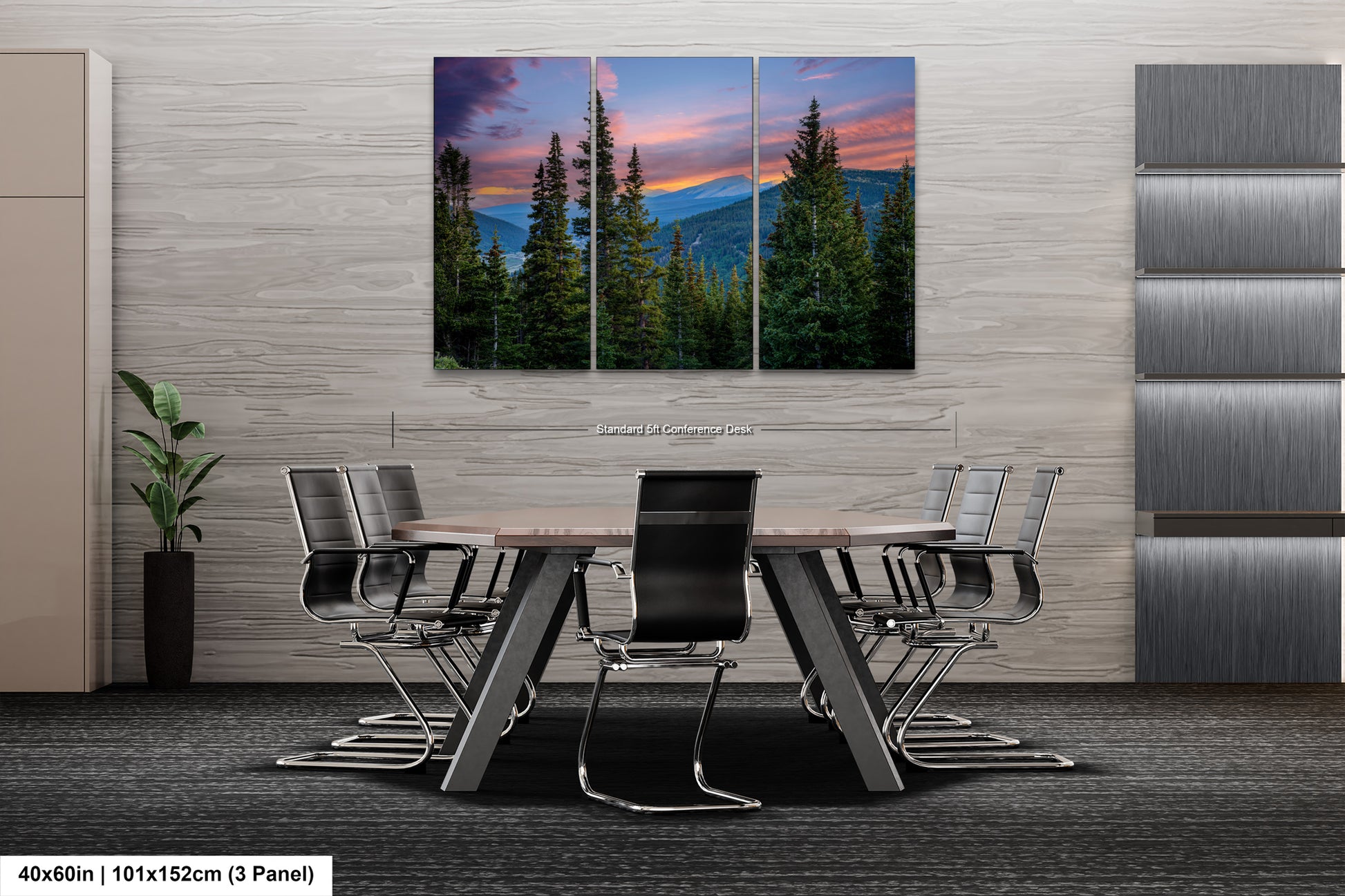 a modern office space with a large, three-panel landscape painting of a forest scene hanging on the wall. The painting is composed of various shades of green, blue, and orange, creating a serene and natural atmosphere. The office space includes a wooden table surrounded by black chairs, providing a comfortable seating area for meetings or discussions.