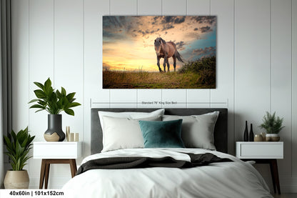 a bedroom with a bed and a painting on the wall
