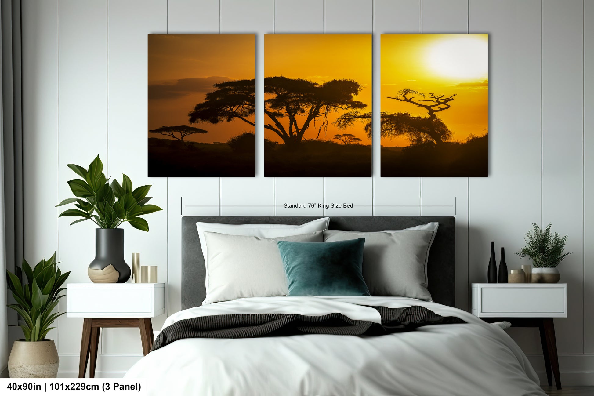 a bedroom with a bed and two paintings on the wall
