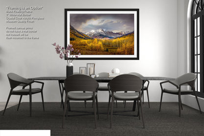 a dining room with a table and chairs