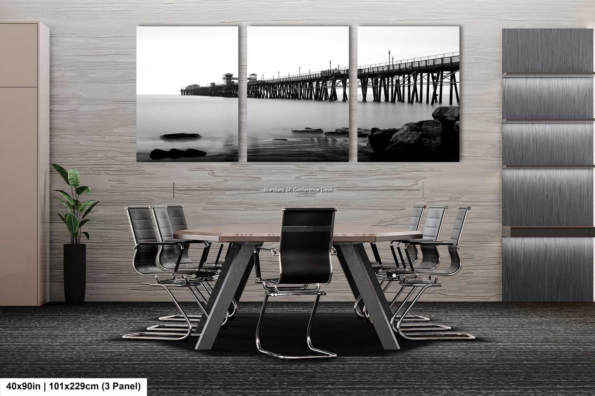 a black and white photo of a table and chairs