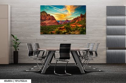 a dining room table with chairs and a painting on the wall