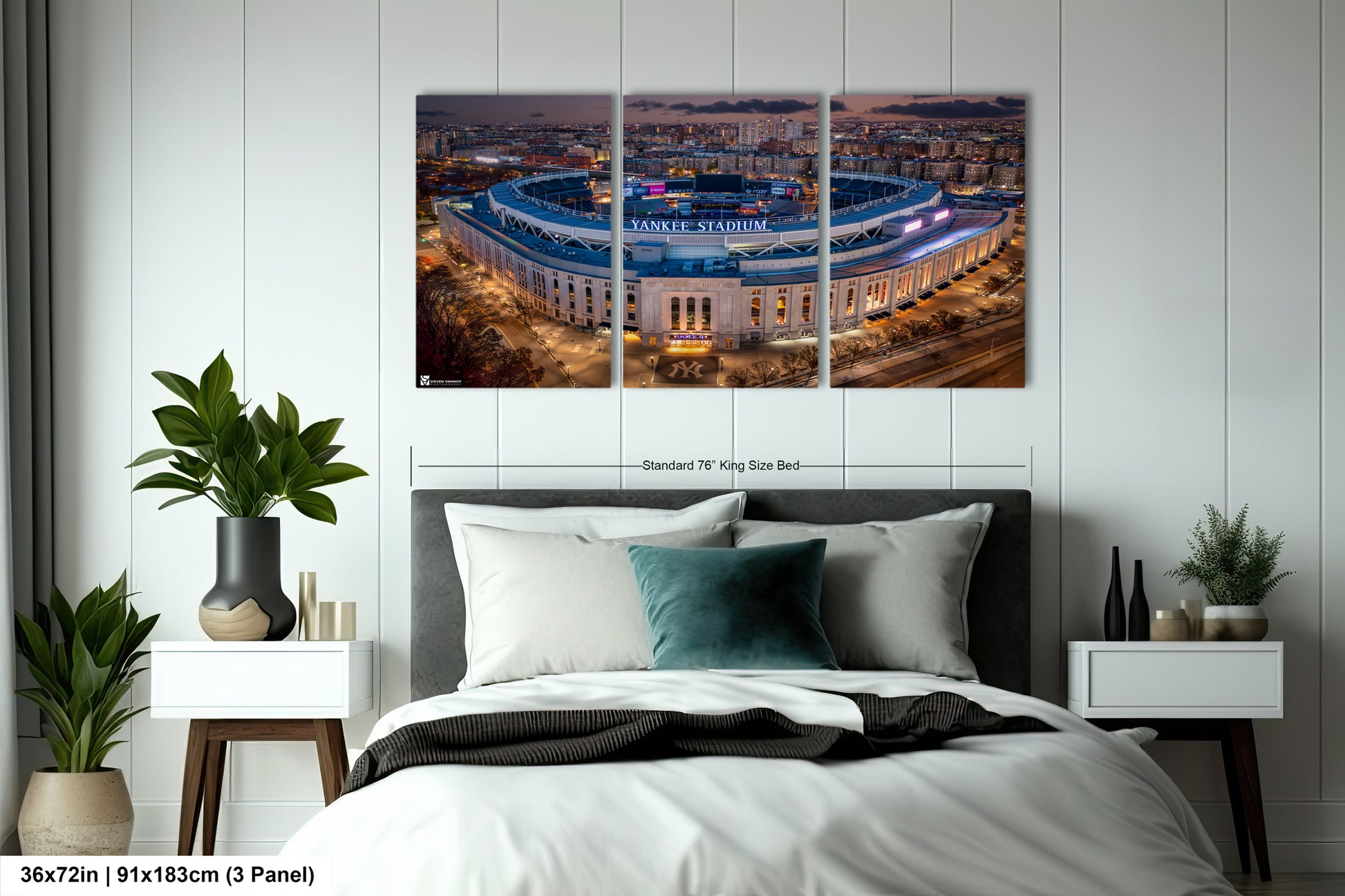 a bed room with a neatly made bed and two pictures on the wall