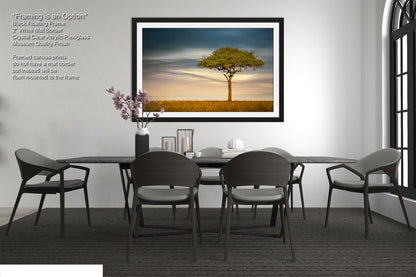 a painting of a tree in a dining room