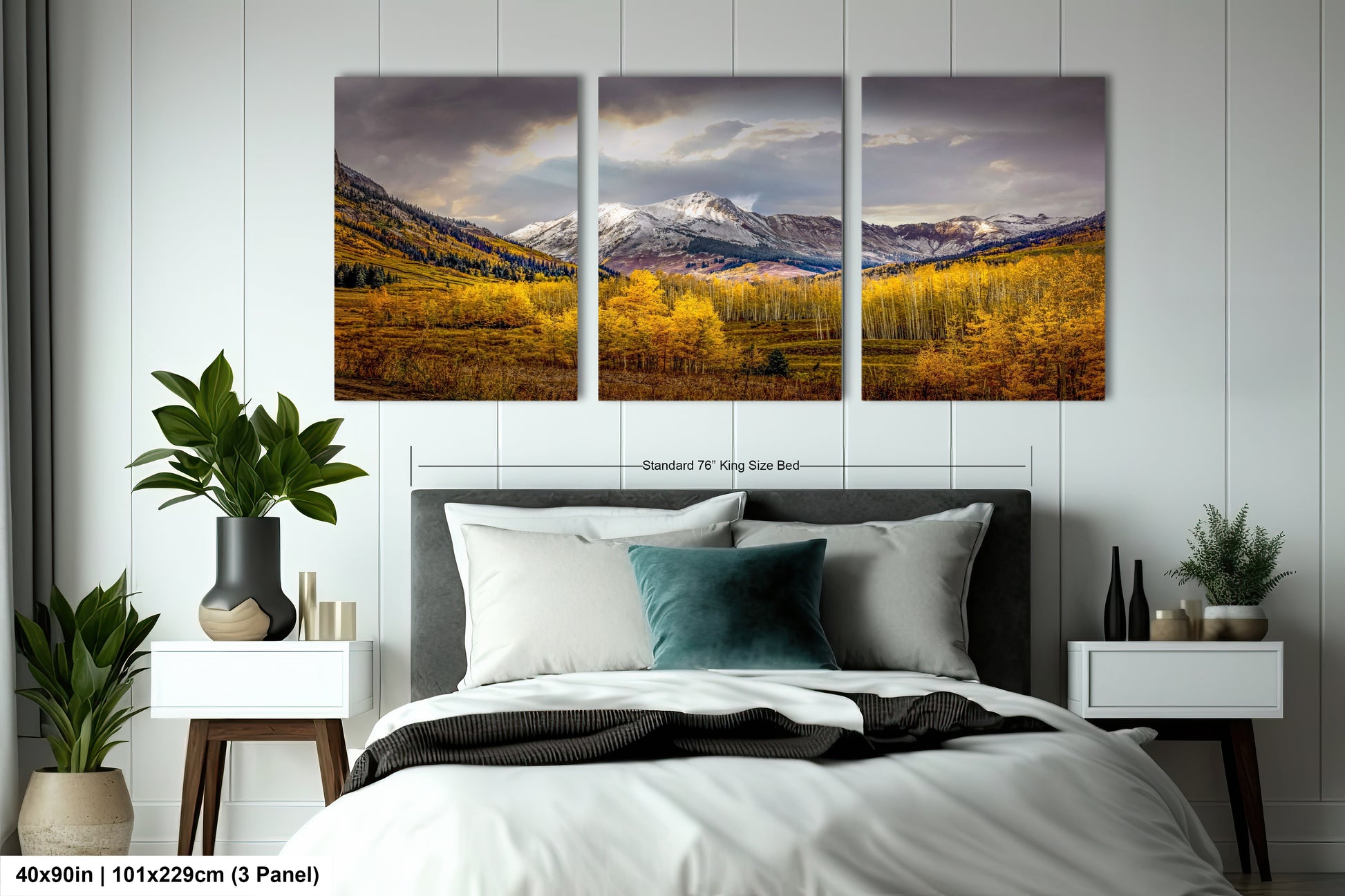 a bed room with a neatly made bed and three pictures on the wall