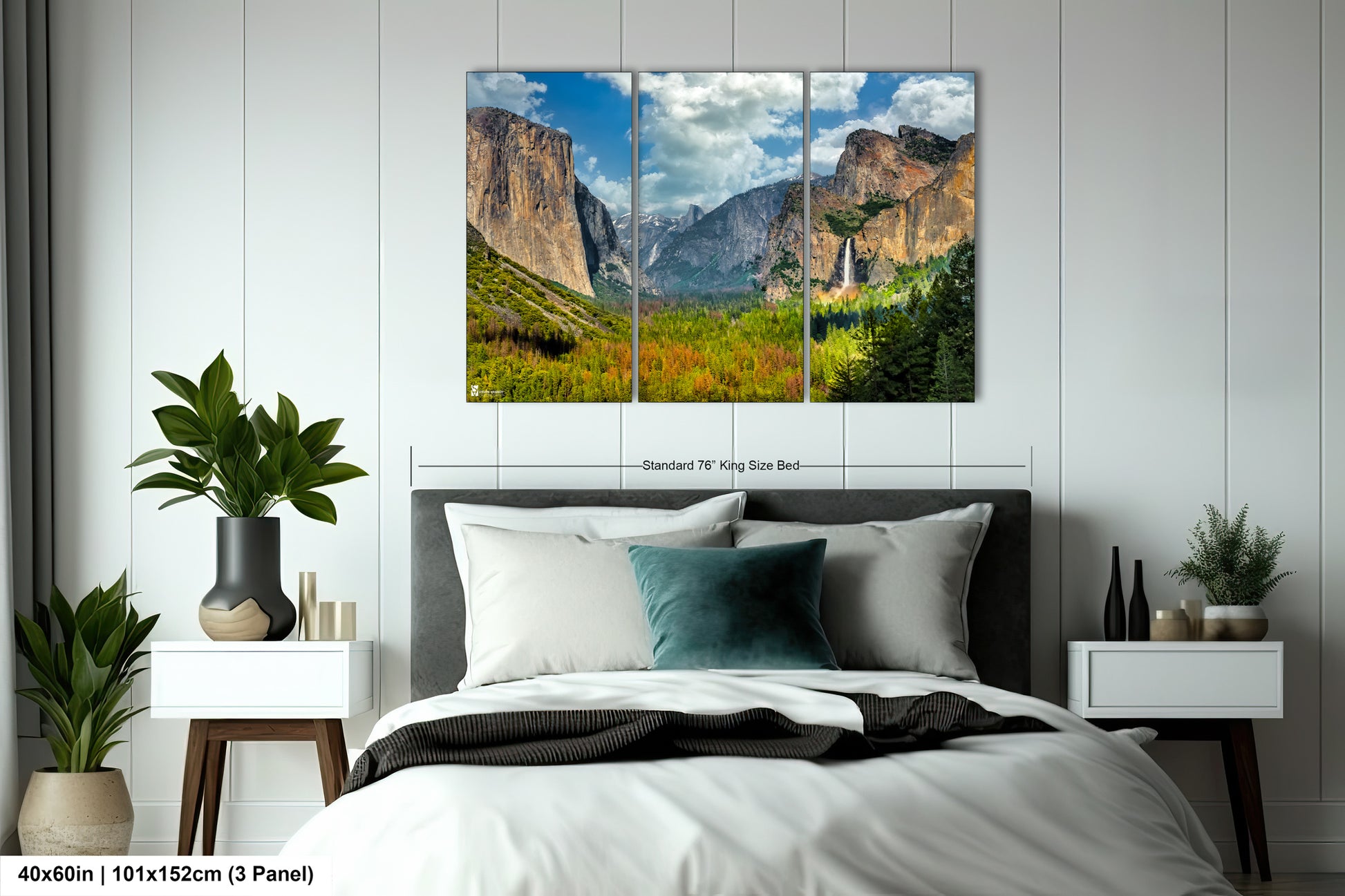 a bed room with a neatly made bed and a painting on the wall