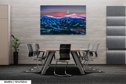 a dining room with a table and chairs