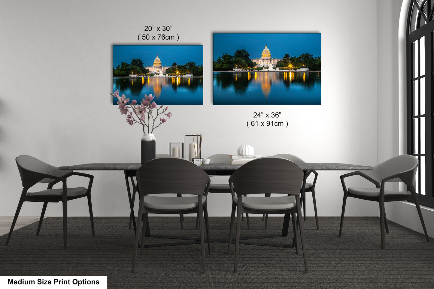 a dining room table with four chairs and a picture of the capitol building