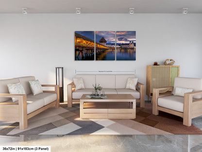 a living room filled with furniture and a painting on the wall