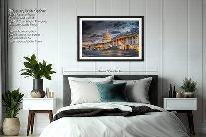 a bedroom with a bed and a picture hanging on the wall