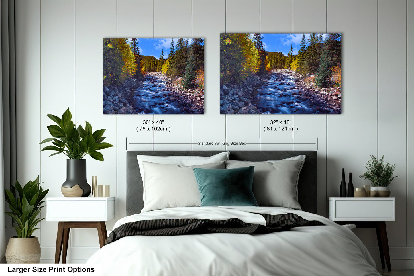 a bedroom with a bed and two pictures on the wall