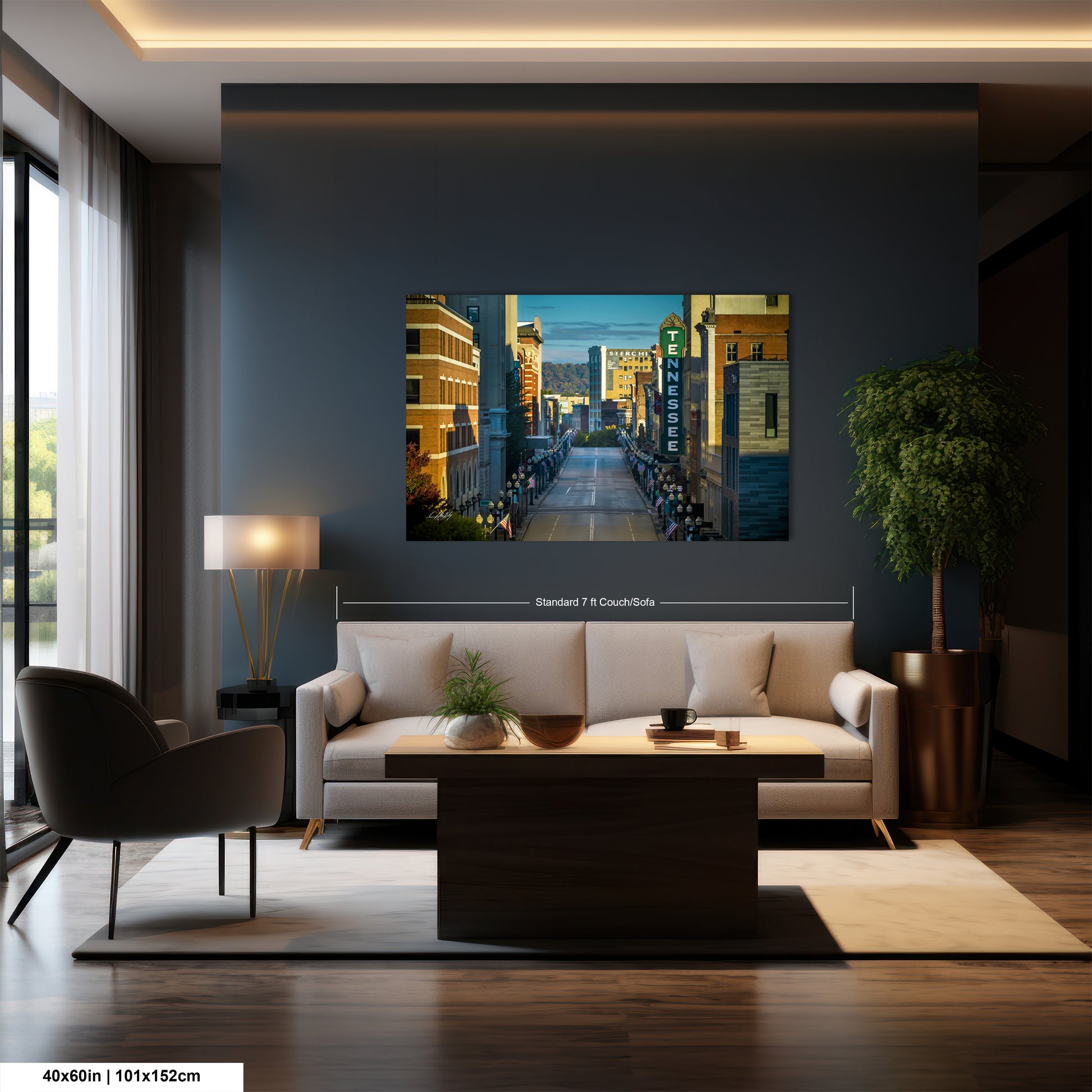 a living room with a couch a table and a painting on the wall