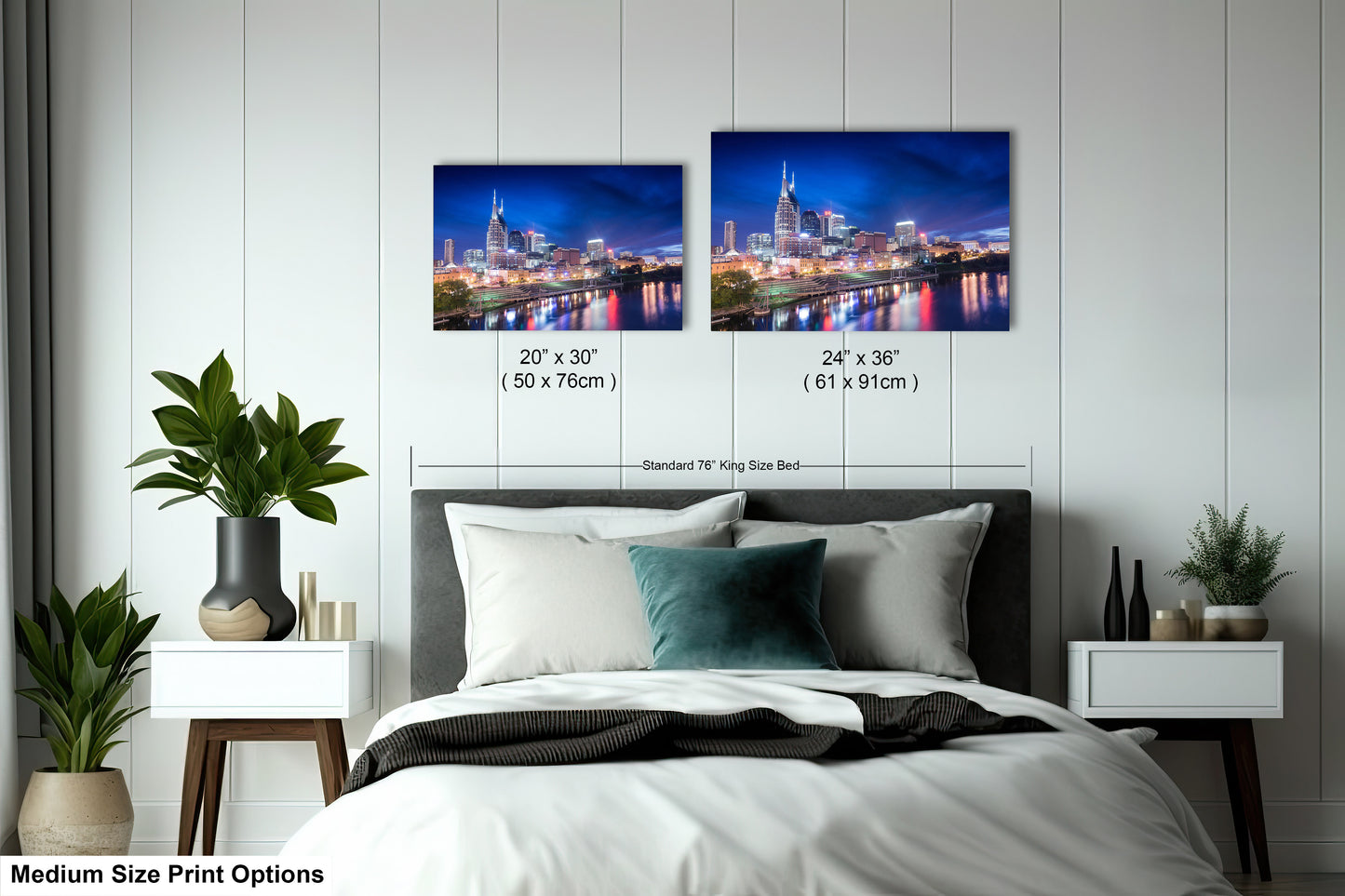 a bedroom with a bed and two pictures on the wall