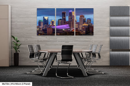 a dining room table with chairs in front of a cityscape