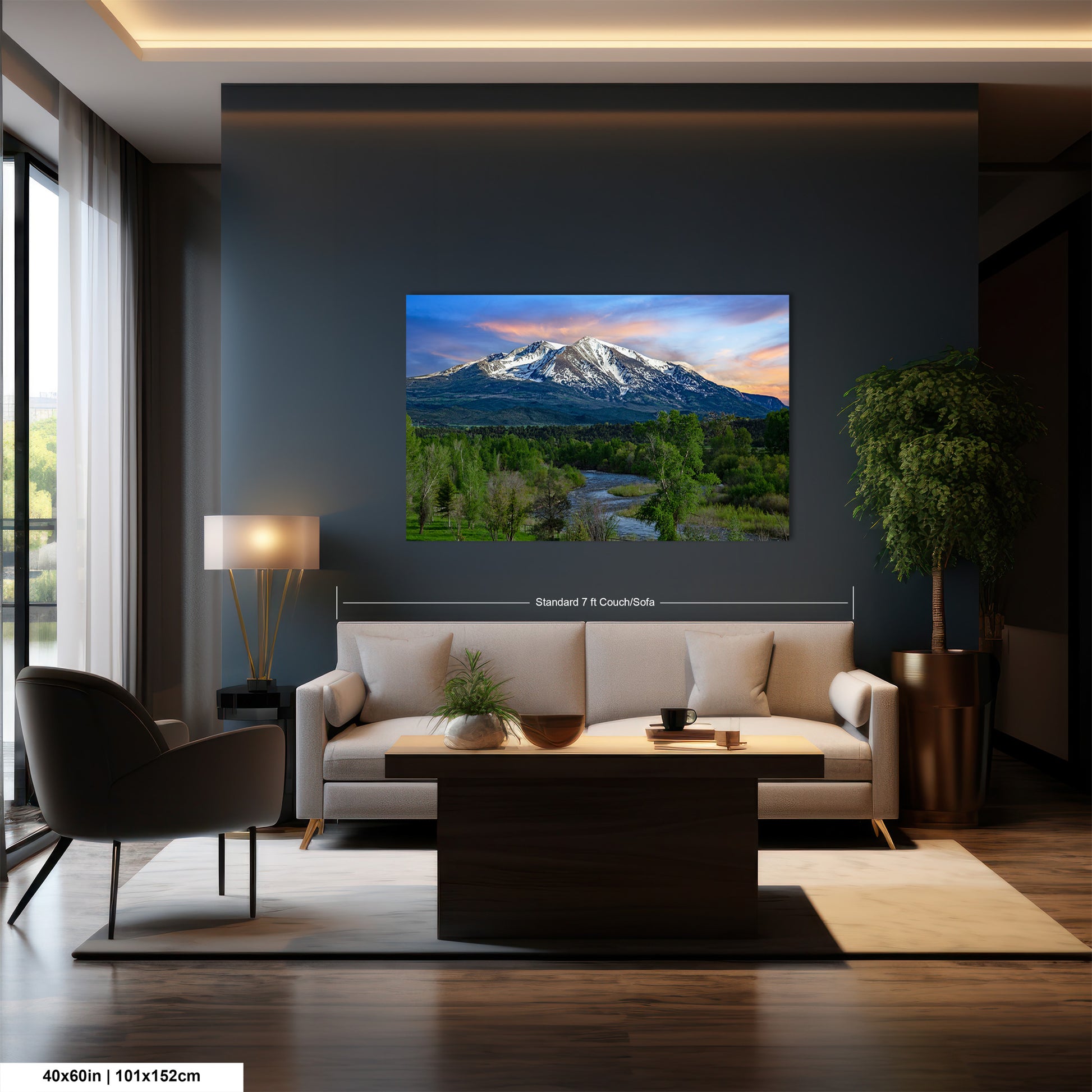a living room with a large painting of a mountain