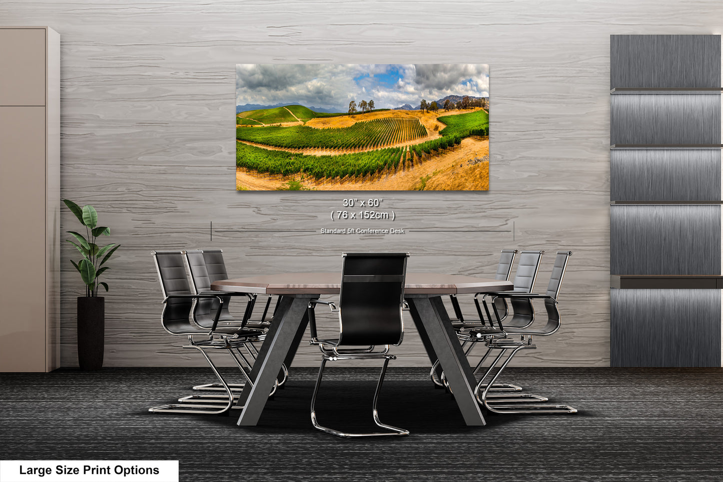 a dining room table with chairs and a painting on the wall