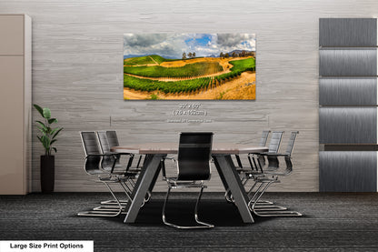 a dining room table with chairs and a painting on the wall