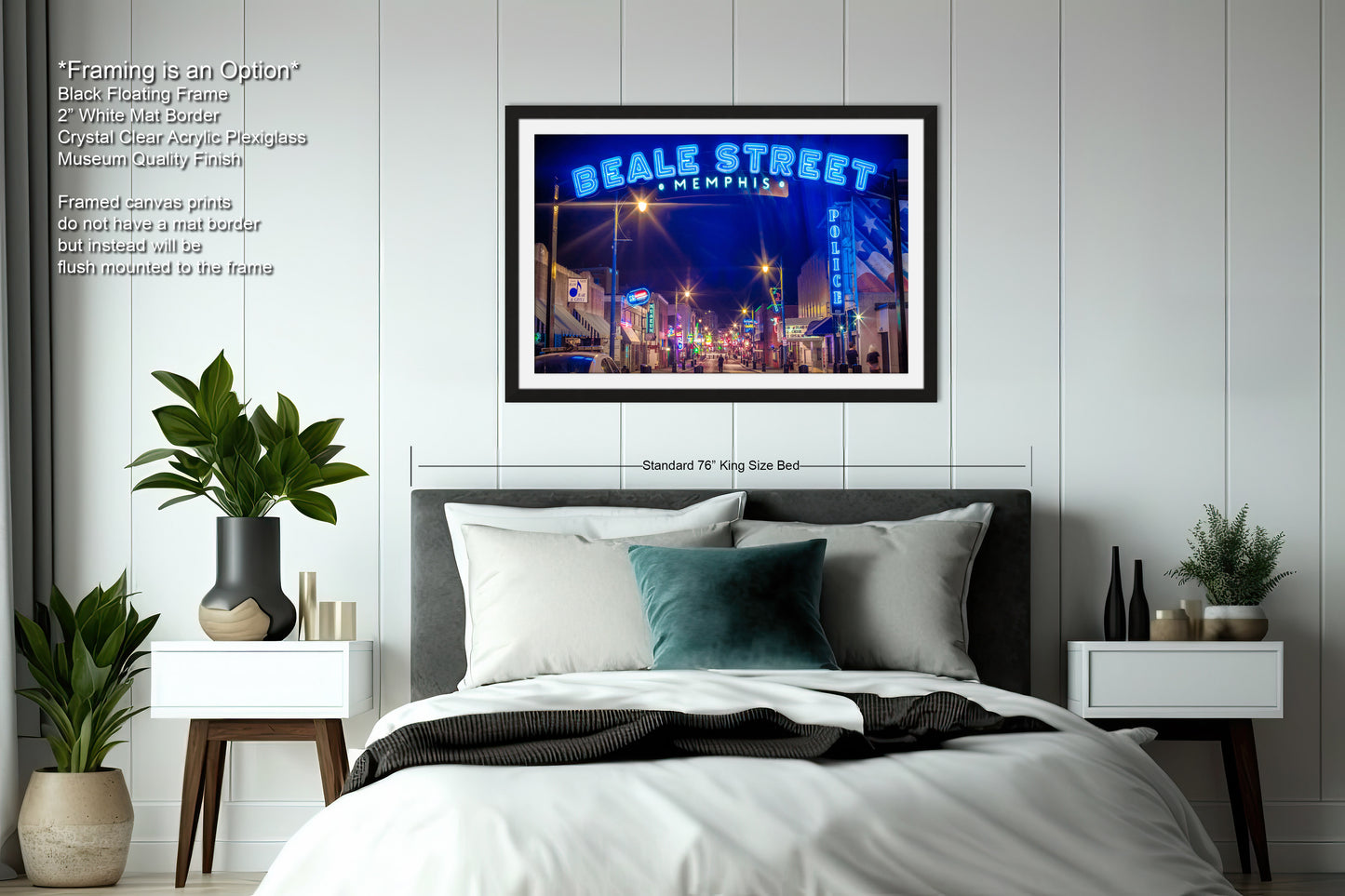 a bedroom with a bed and a picture hanging on the wall