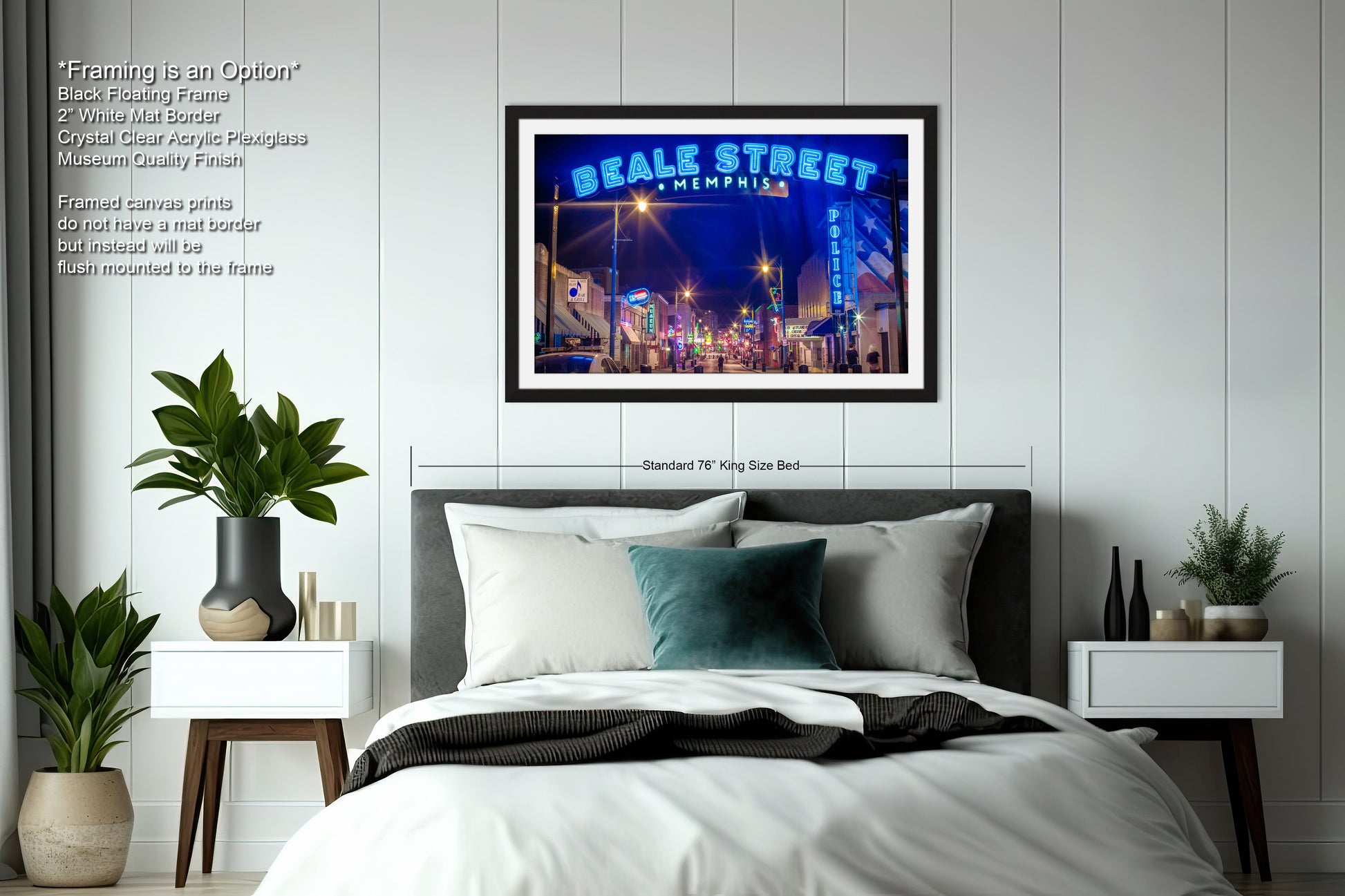 a bedroom with a bed and a picture hanging on the wall
