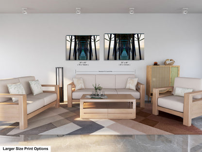 a living room filled with furniture and a painting on the wall