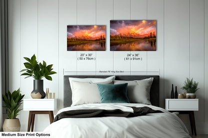 a bed room with a neatly made bed and two pictures on the wall