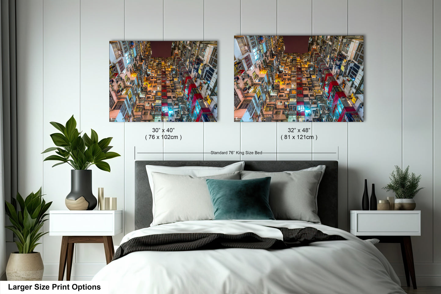 a bedroom with a bed and two pictures on the wall
