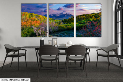 a dining room with a table and four chairs