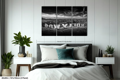 a black and white photo of a bedroom