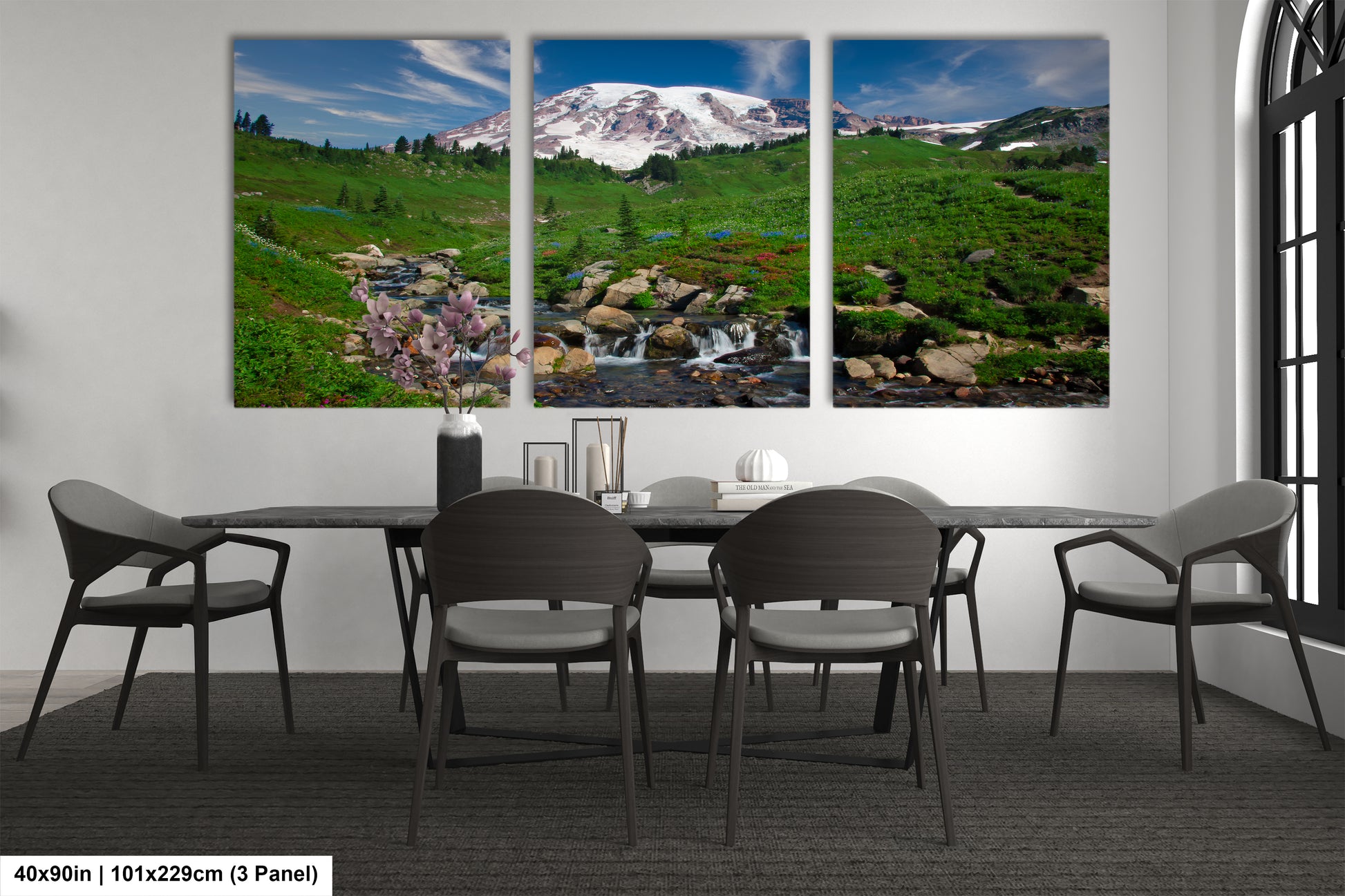 a dining room with a table and chairs