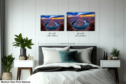 a bedroom with a bed and two pictures on the wall