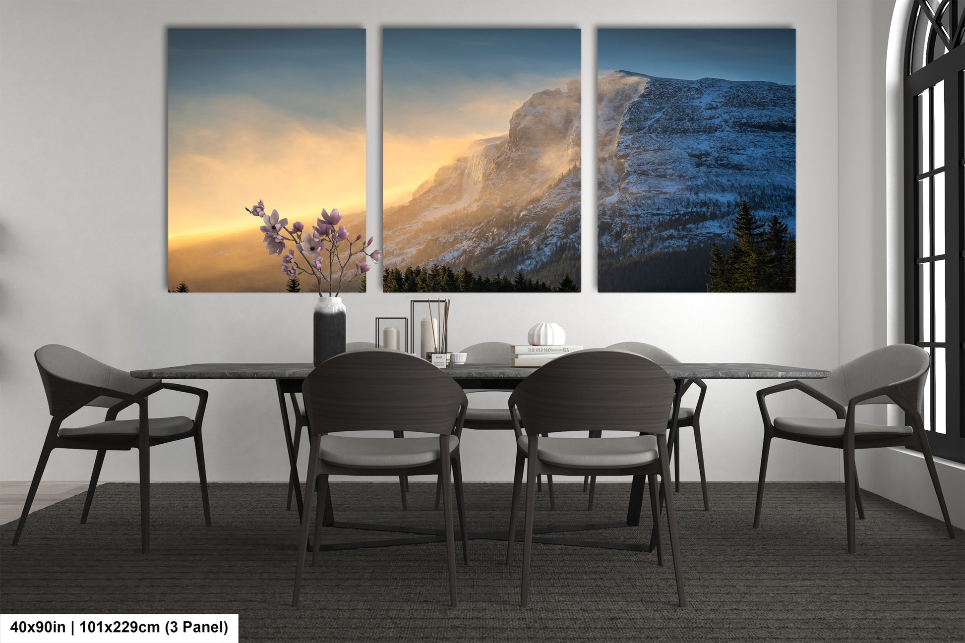 a dining room with a table and four chairs